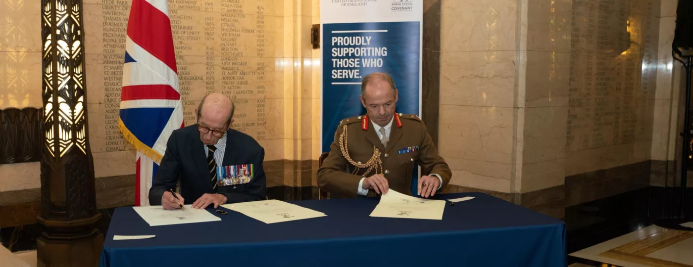 HRH The Duke of Kent and Major General Simon Graham signing the Armed Forces Covenant