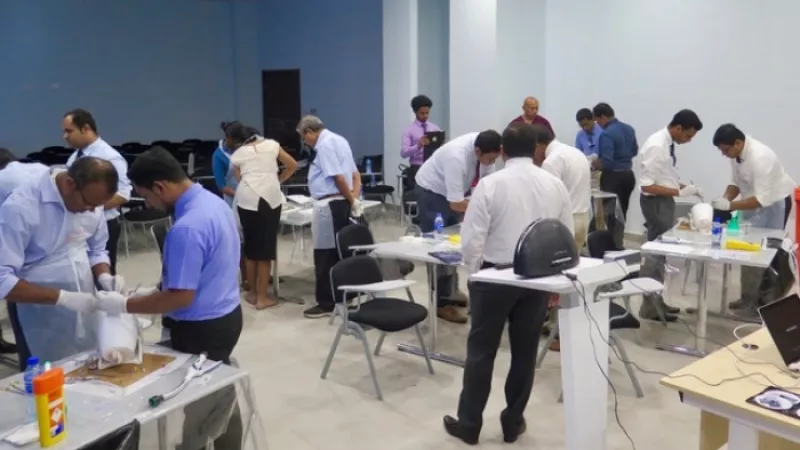 Trainee surgeons undertaking hands on exercises, Sri Lanka
