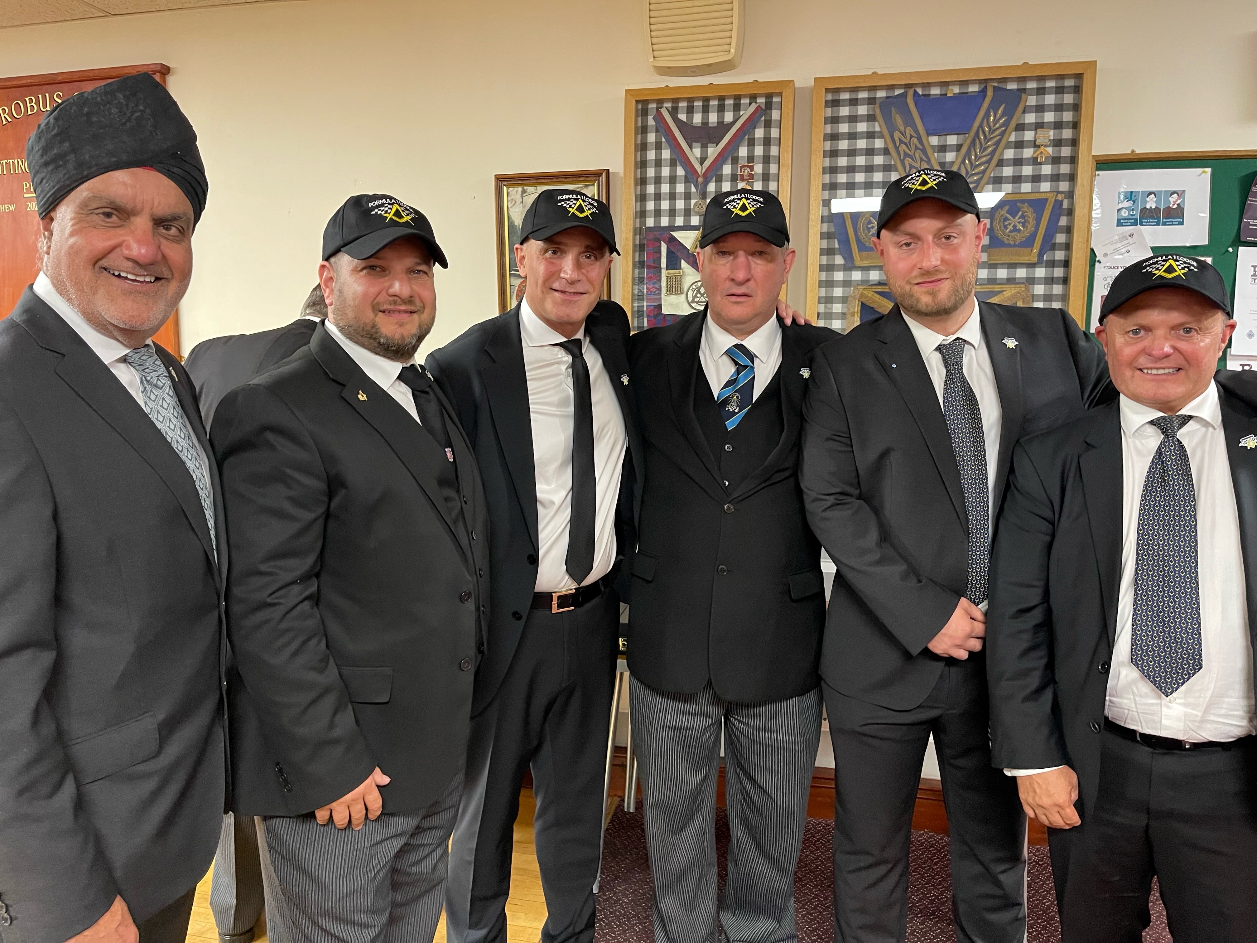 Freemasons wearing formula one hats