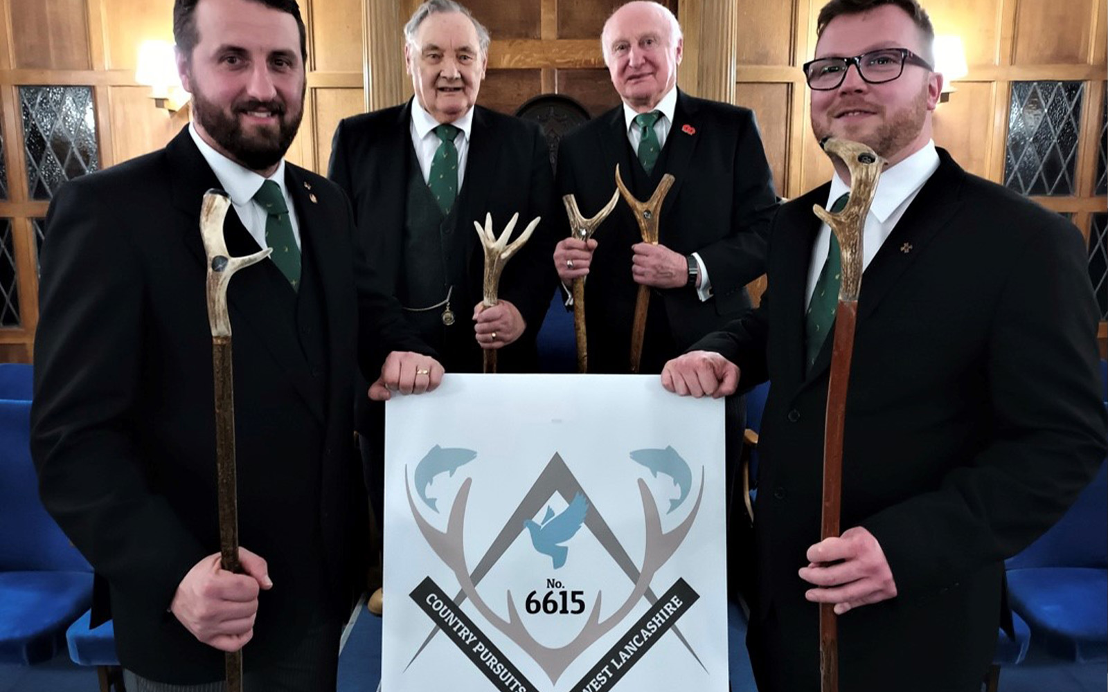 Proudly displaying the new wands. Pictured from left to right, are David Jenkinson, Mike Casey, Bob Reeves (Wand maker) and Will Buchanan 