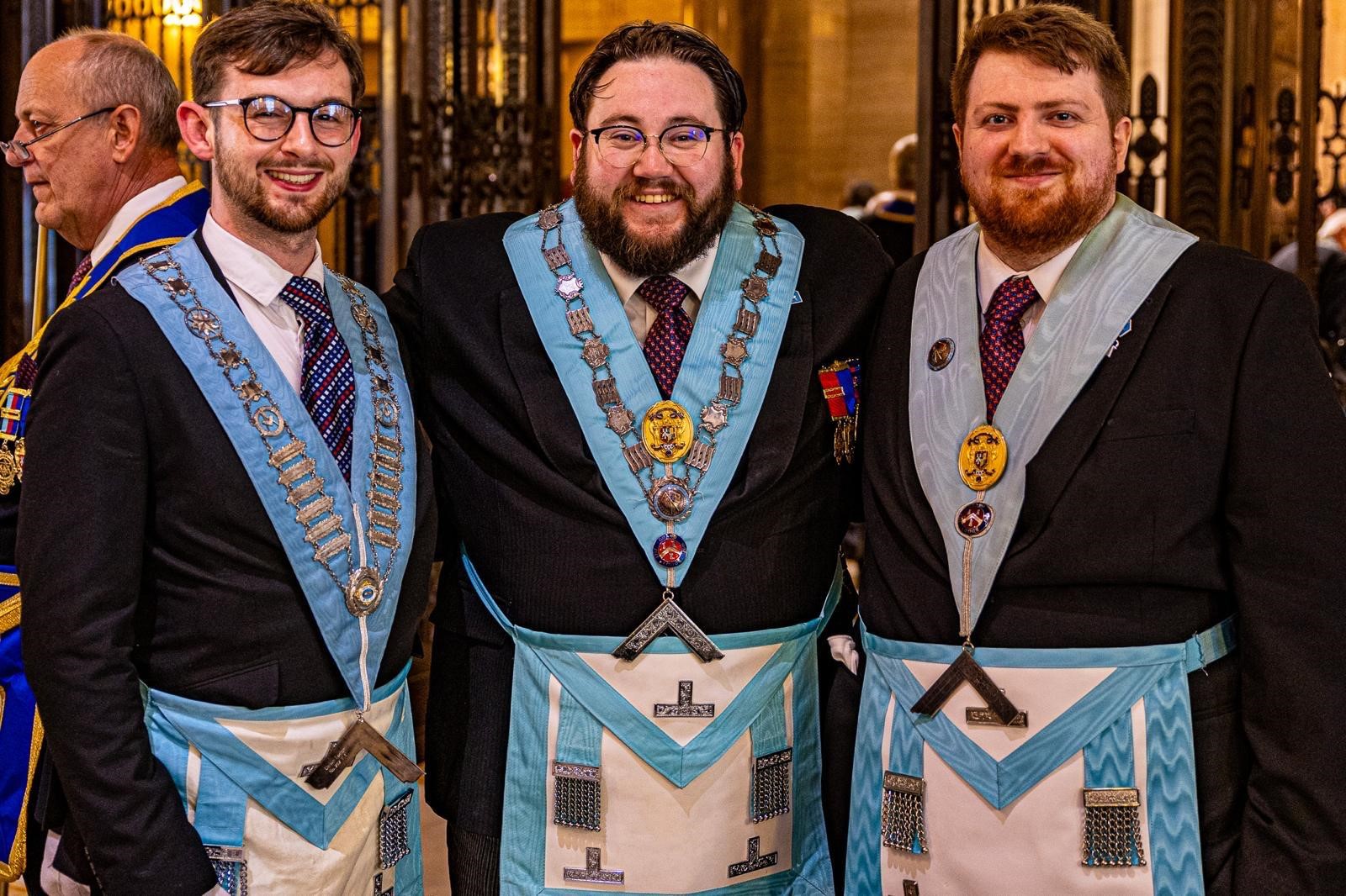 Photo of three Light Blue members at Freemasons' Hall