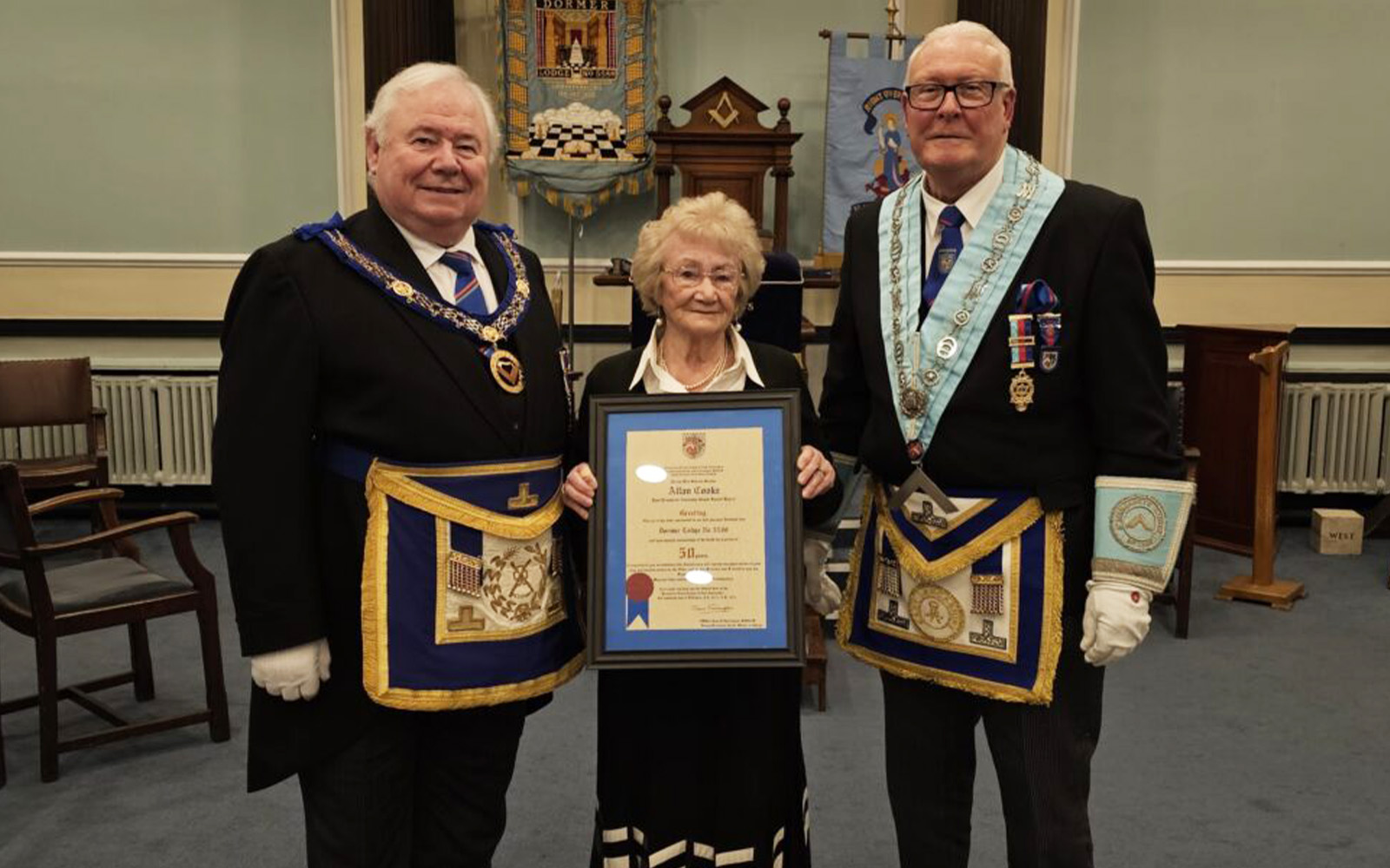 Marjorie with Ian MacNeil and Harold Cooper.