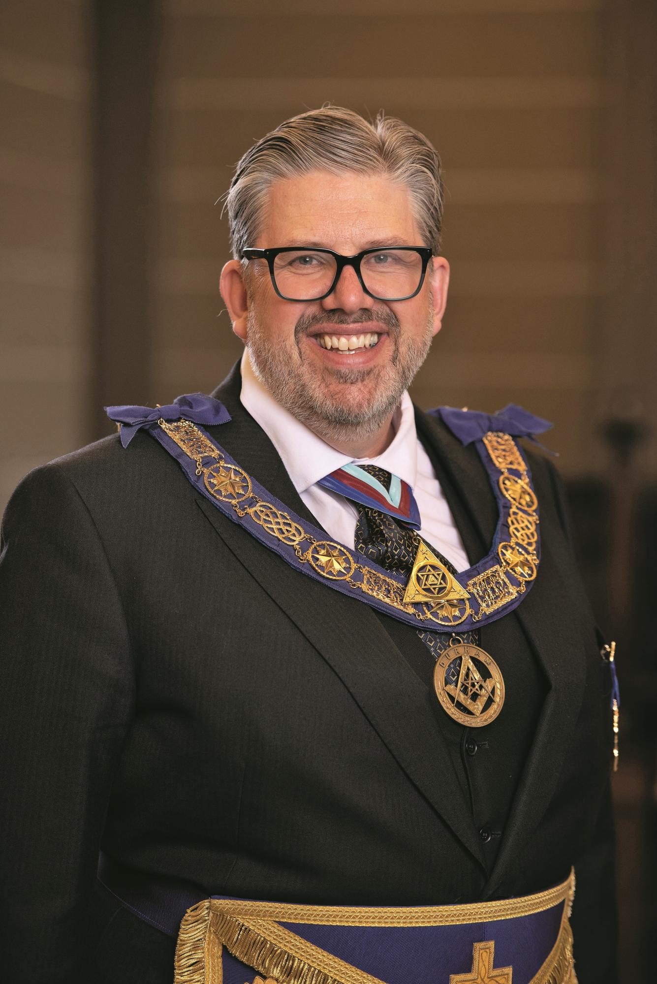 A photo of John Thompson wearing his masonic regalia