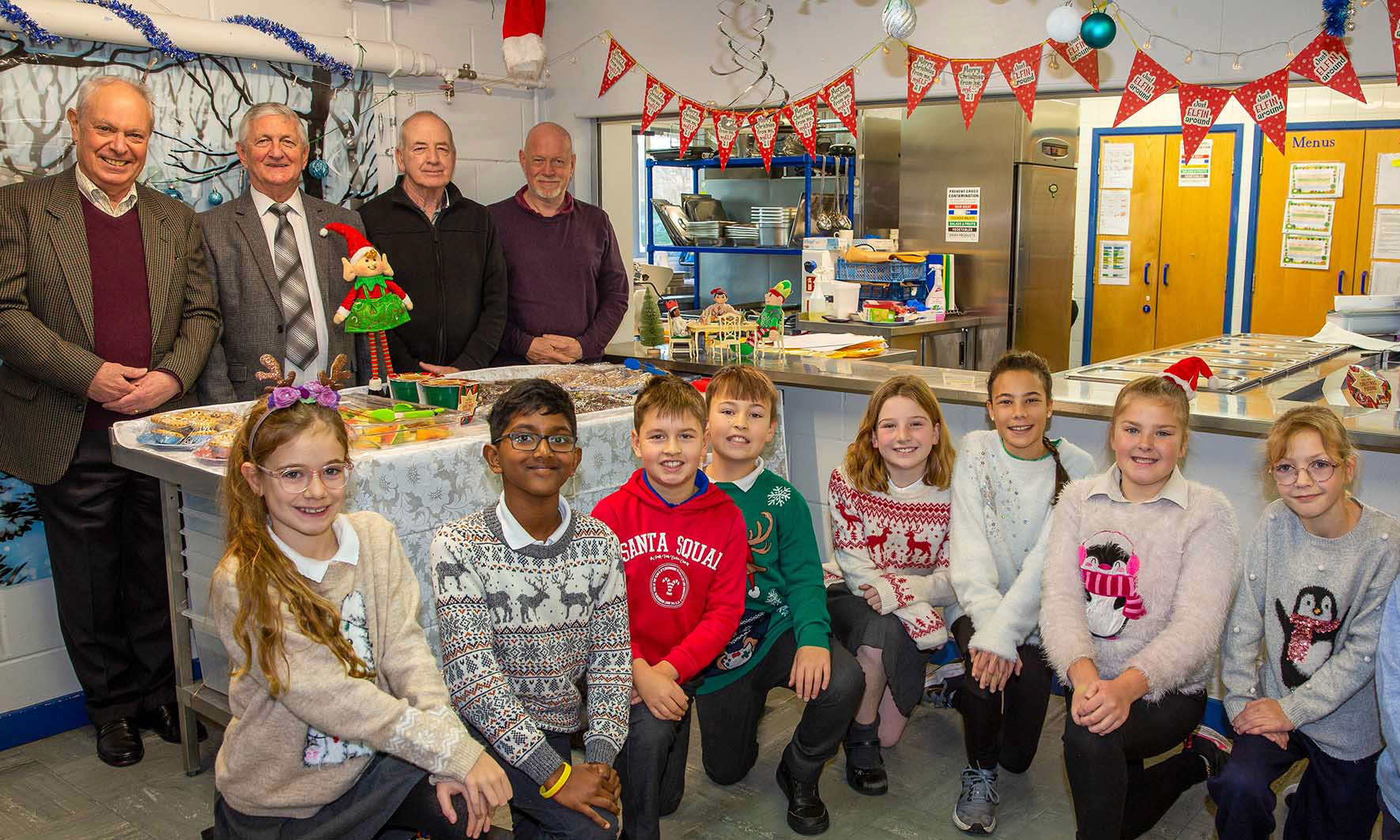 Highfields Primary pupils and staff thank Royal Arch Masons Martin Cook (back row left) and Companions