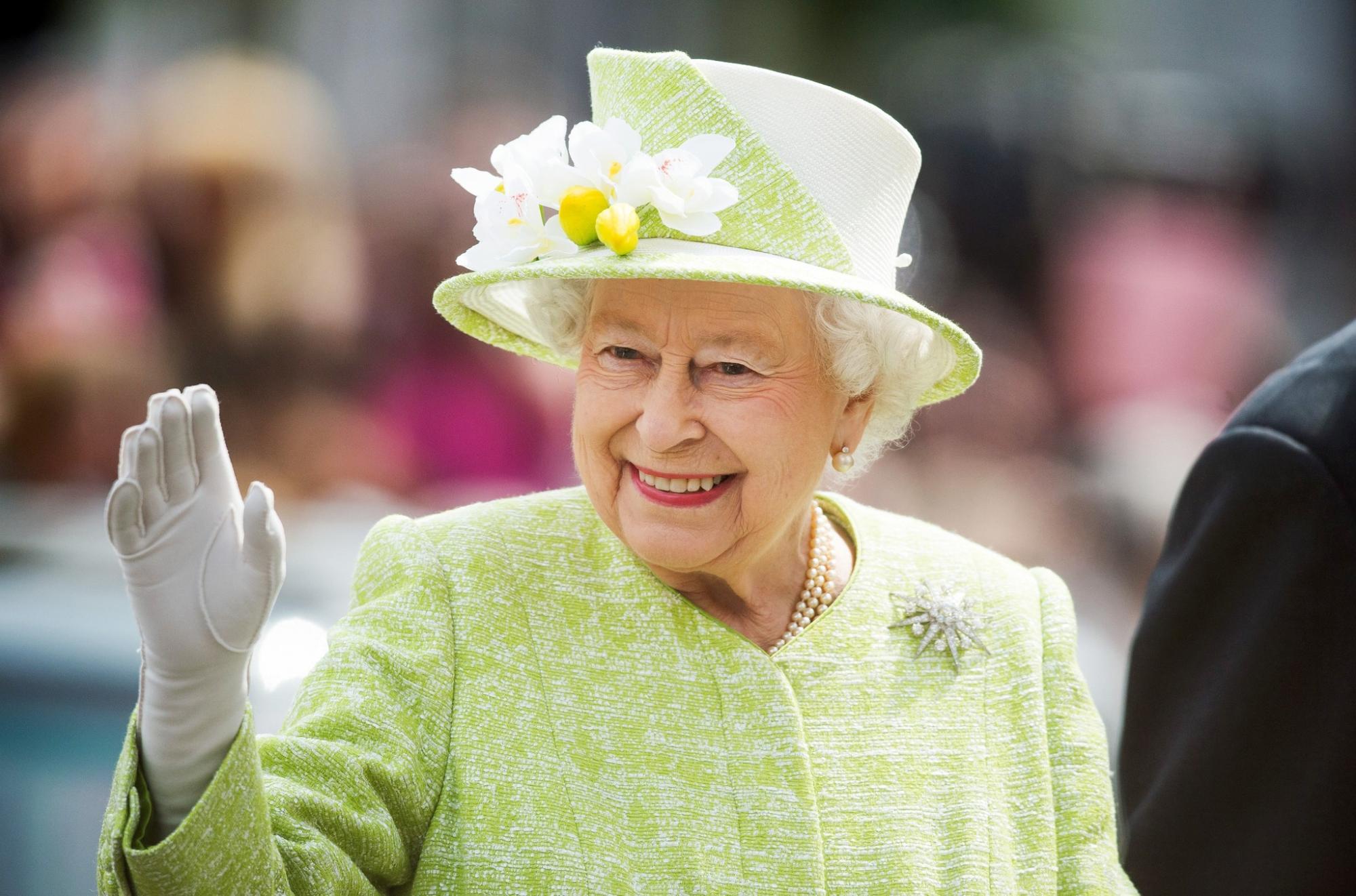 Photo of Her Majesty Queen Elizabeth II in a green dress