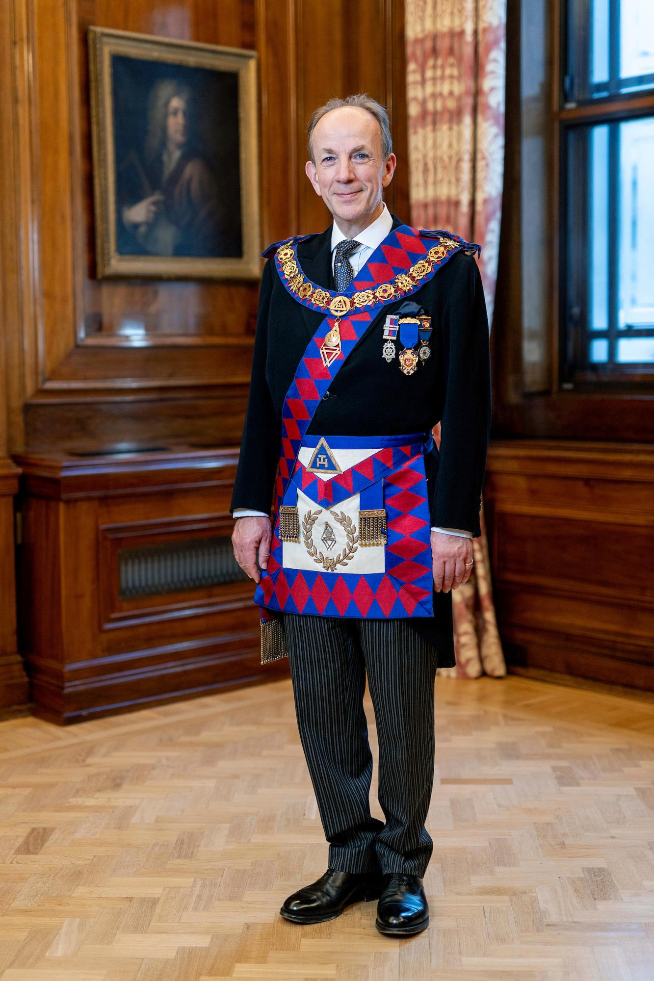 Pro Grand Master and Pro First Grand Principle Jonathon Spence is stood wearing full regailia.