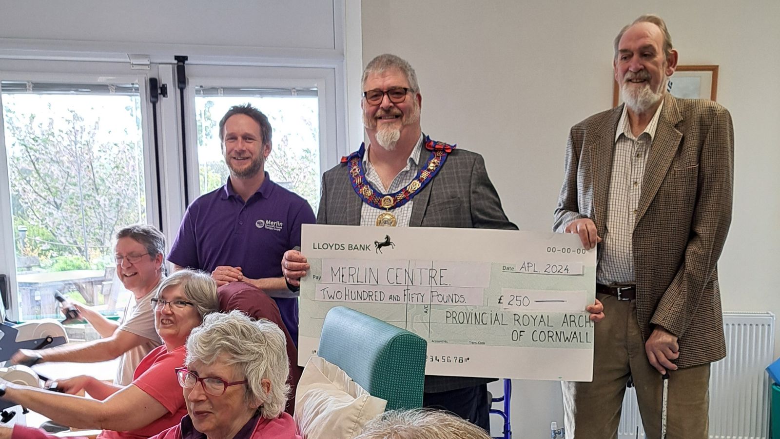 Jon Arnold, Deputy Grand Superintendent in the Royal Arch in Cornwall was accompanied by the Provincial Grand Charity Steward, Bill Truscott to present a cheque to the Merlin Neuro Therapy Centre to the sum of £250.