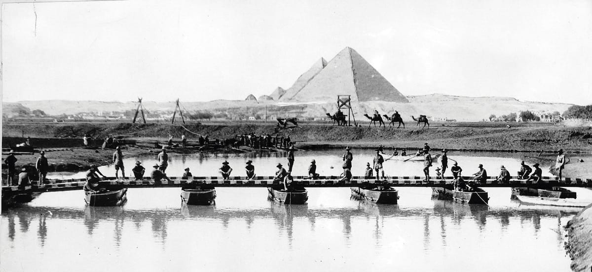 Building a bridge over a river near the pyramids in Egypt, c.1916