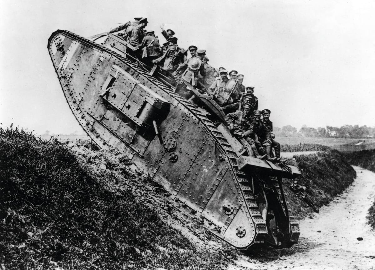 British Mark IV tank with Canadian soldiers.