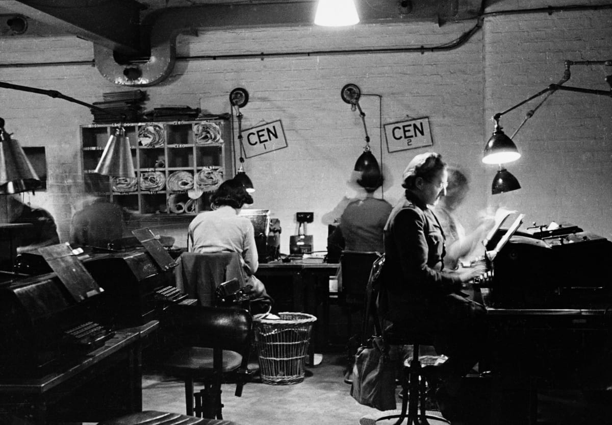 A group of women form a typing pool for war correspondents