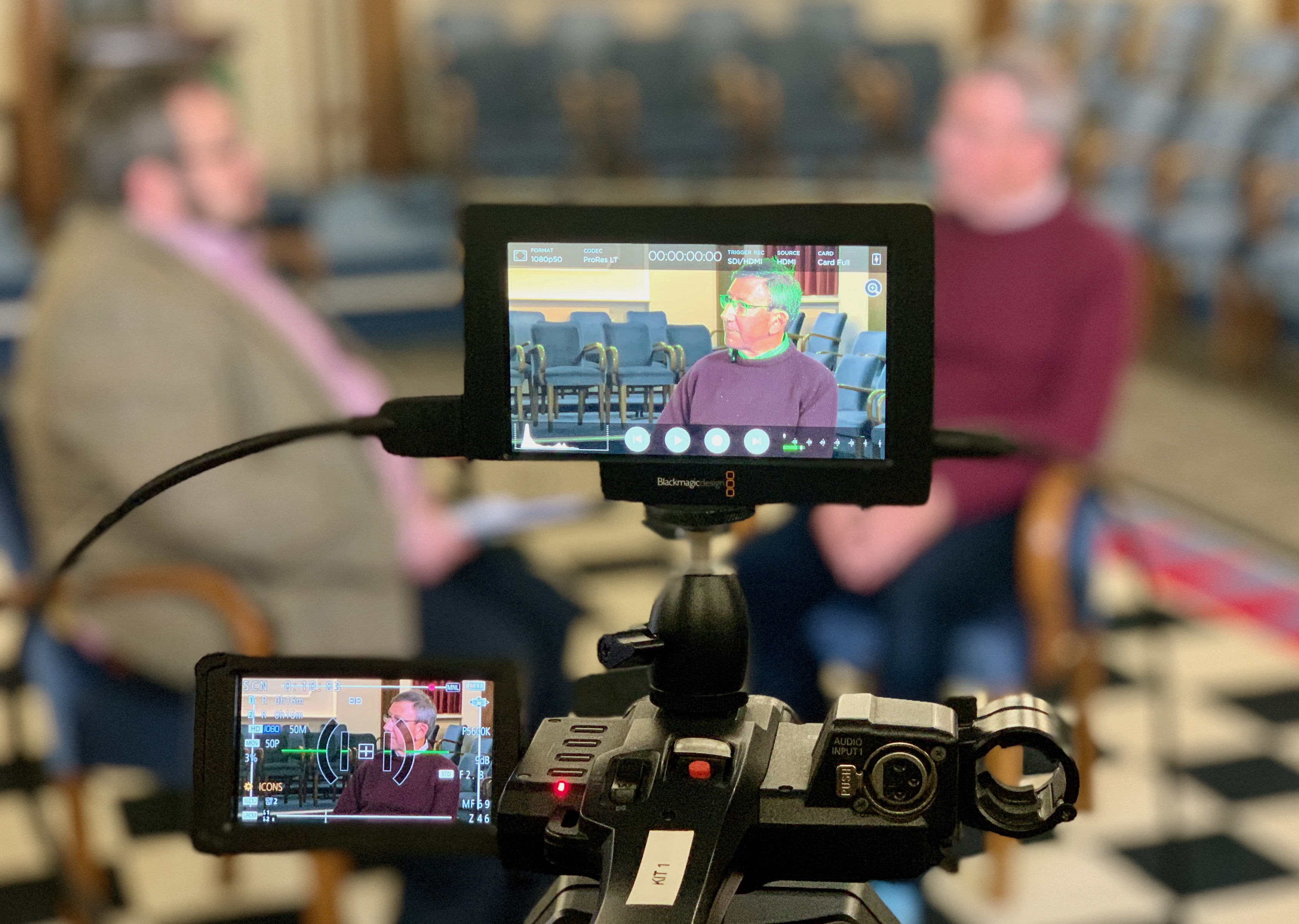 Camera view of Chris Watkins interviewing Assistant Provincial Grand Master Peter Brooks