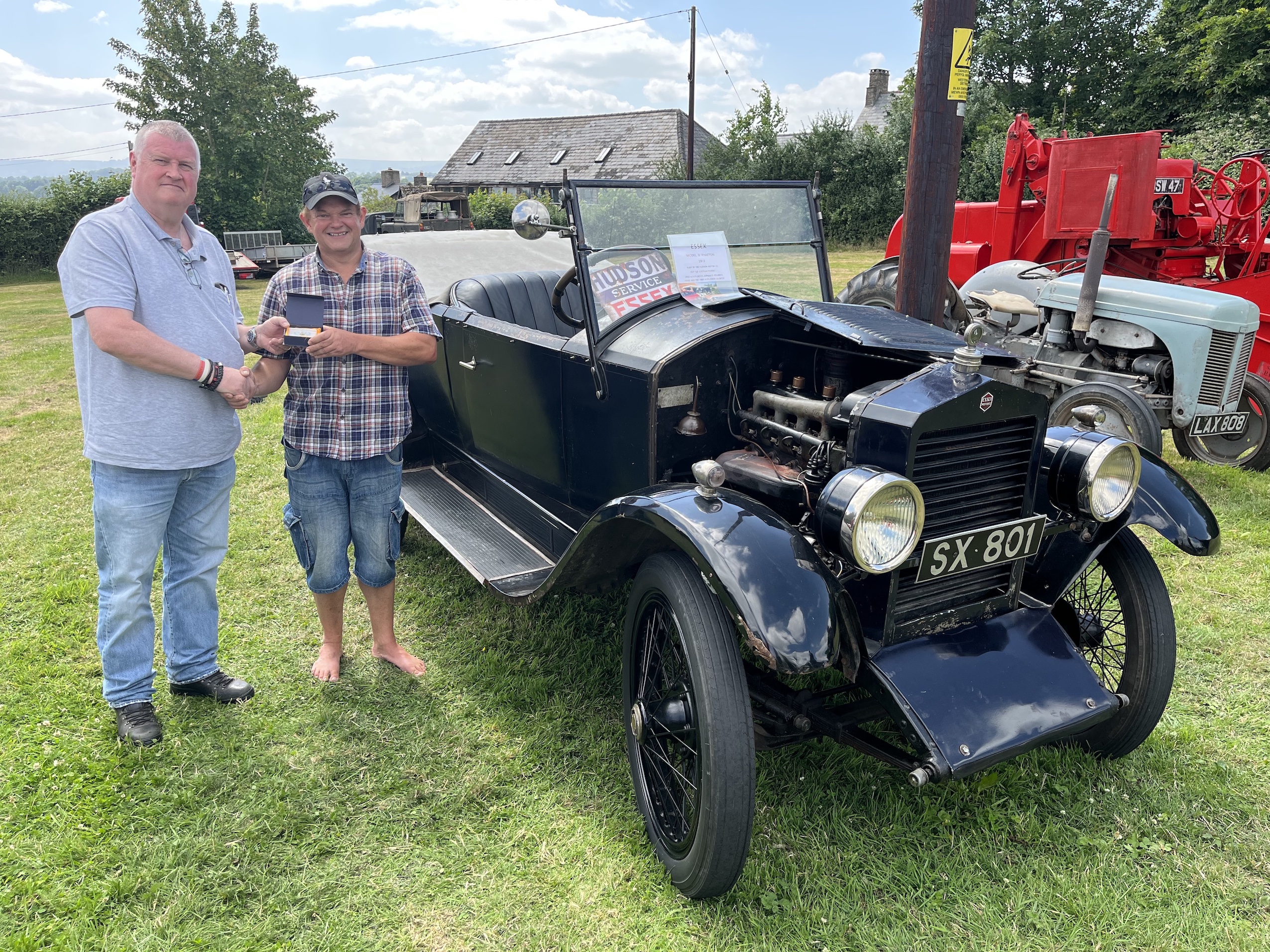 Judges Favourite award presented by Monmouthshire Deputy Provincial Grand Master Chris Evans to the owner of a 1911 Hudson Saloon car