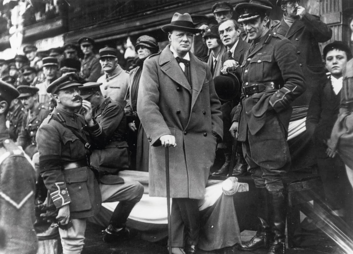 Churchill watching the 47th (1/2nd London) Division from the grandstand of the Grand Palais de Lille, 22 October 1918