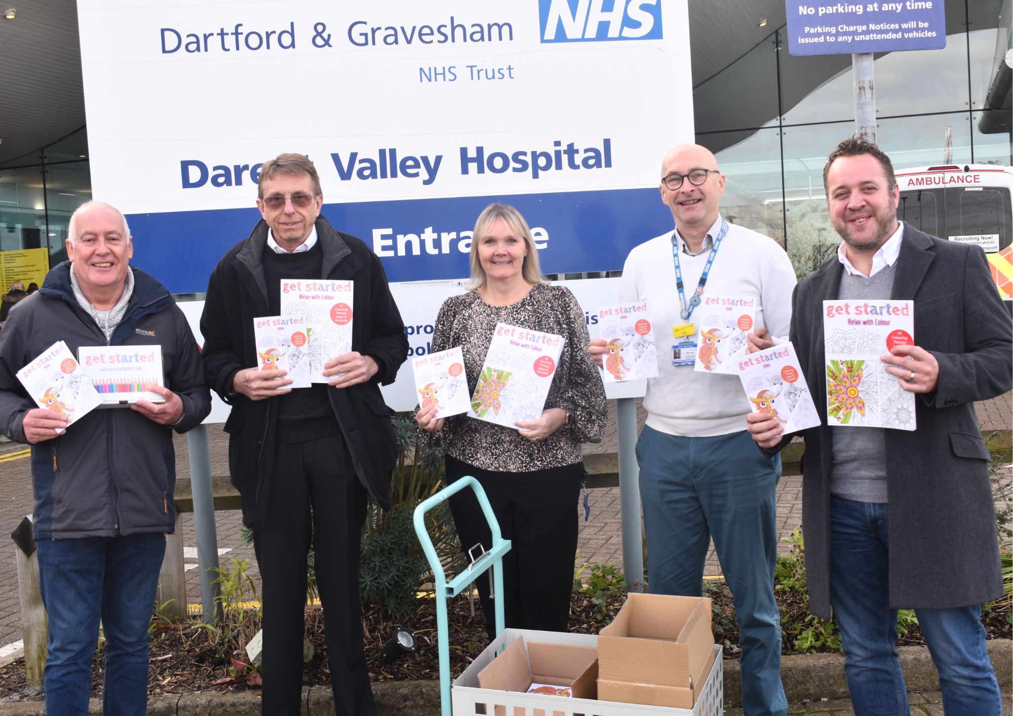 Freemasons donating colouring books to the NHS