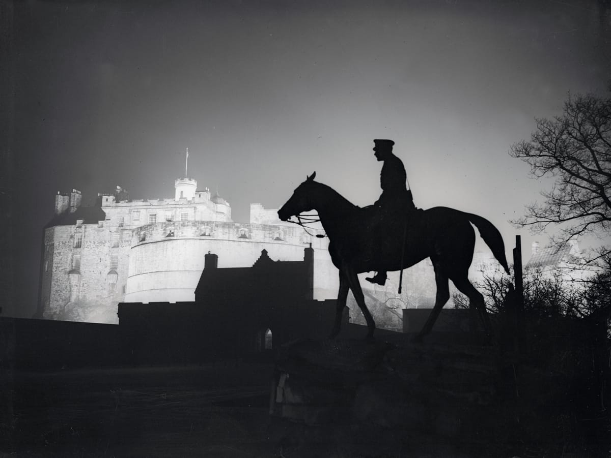 Statue of Haig (1861-1928) silhouetted against floodlit Edinburgh Castle, 19 March 1935