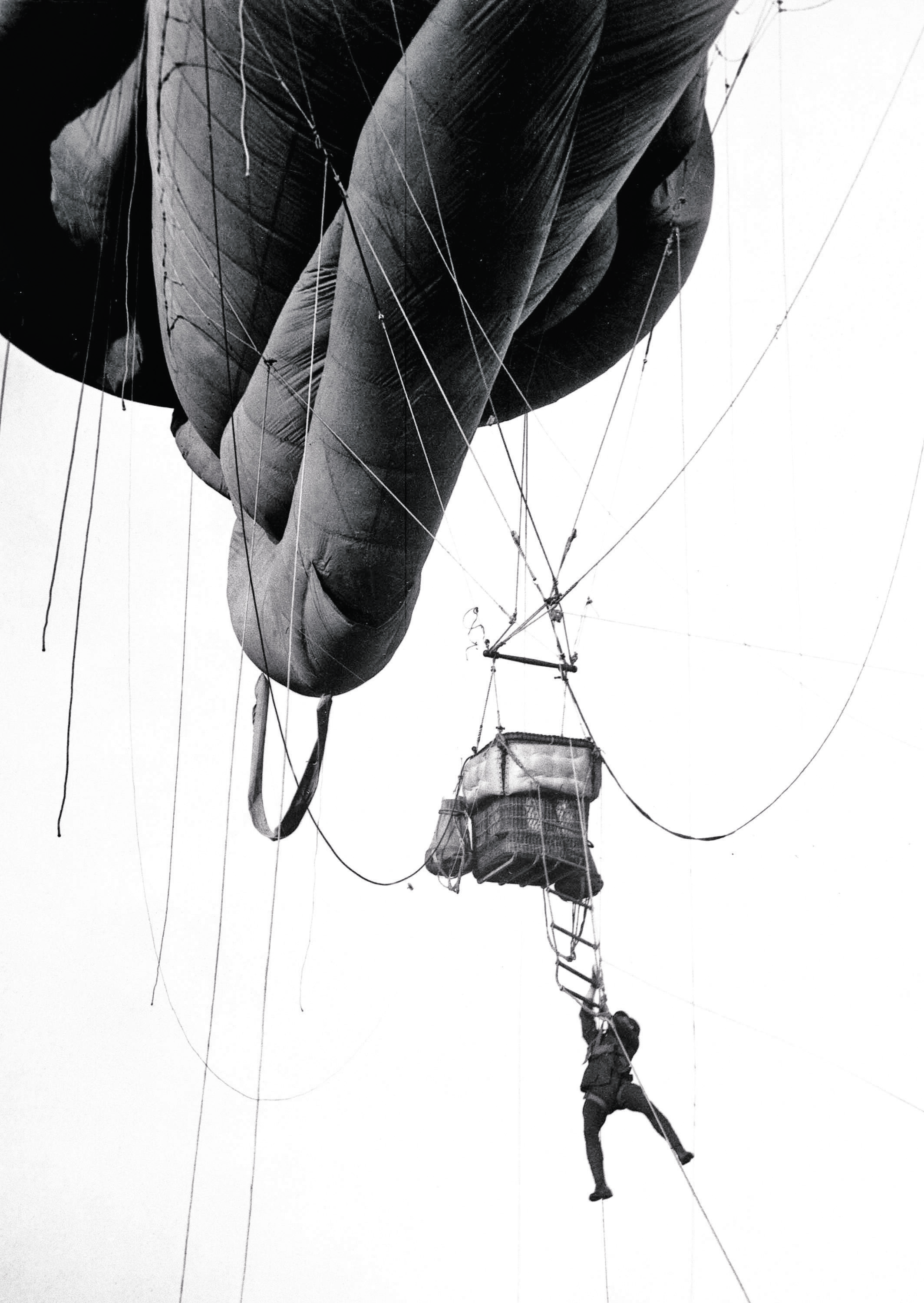 black and white photo from curated tour at Freemasons' Hall depicting a solider hanging from a hot air balloon