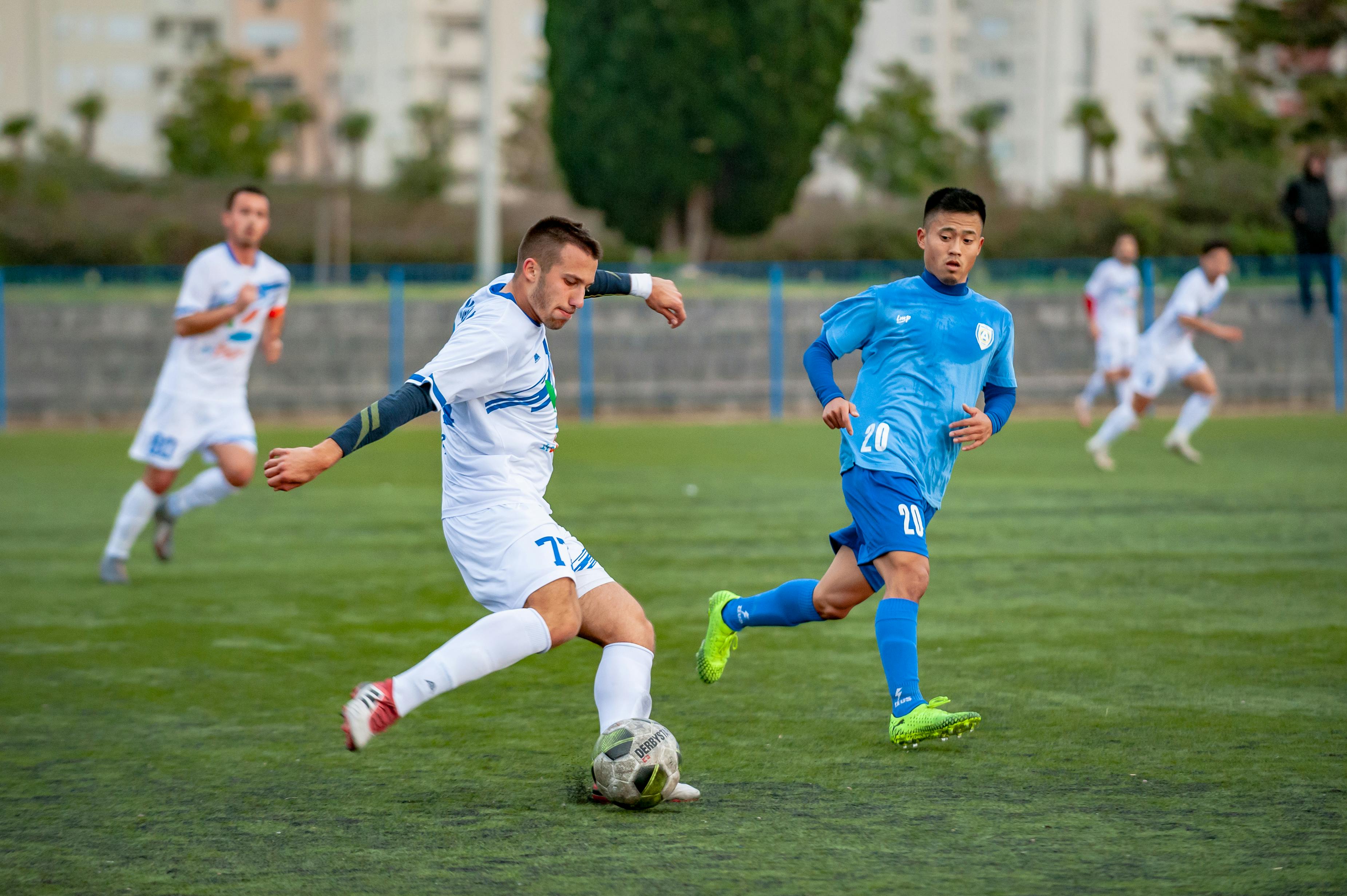 Two players playing football