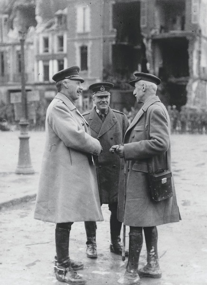 General Sir Henry Rawlinson chats with a French war correspondent in recaptured Peronne, c.1918