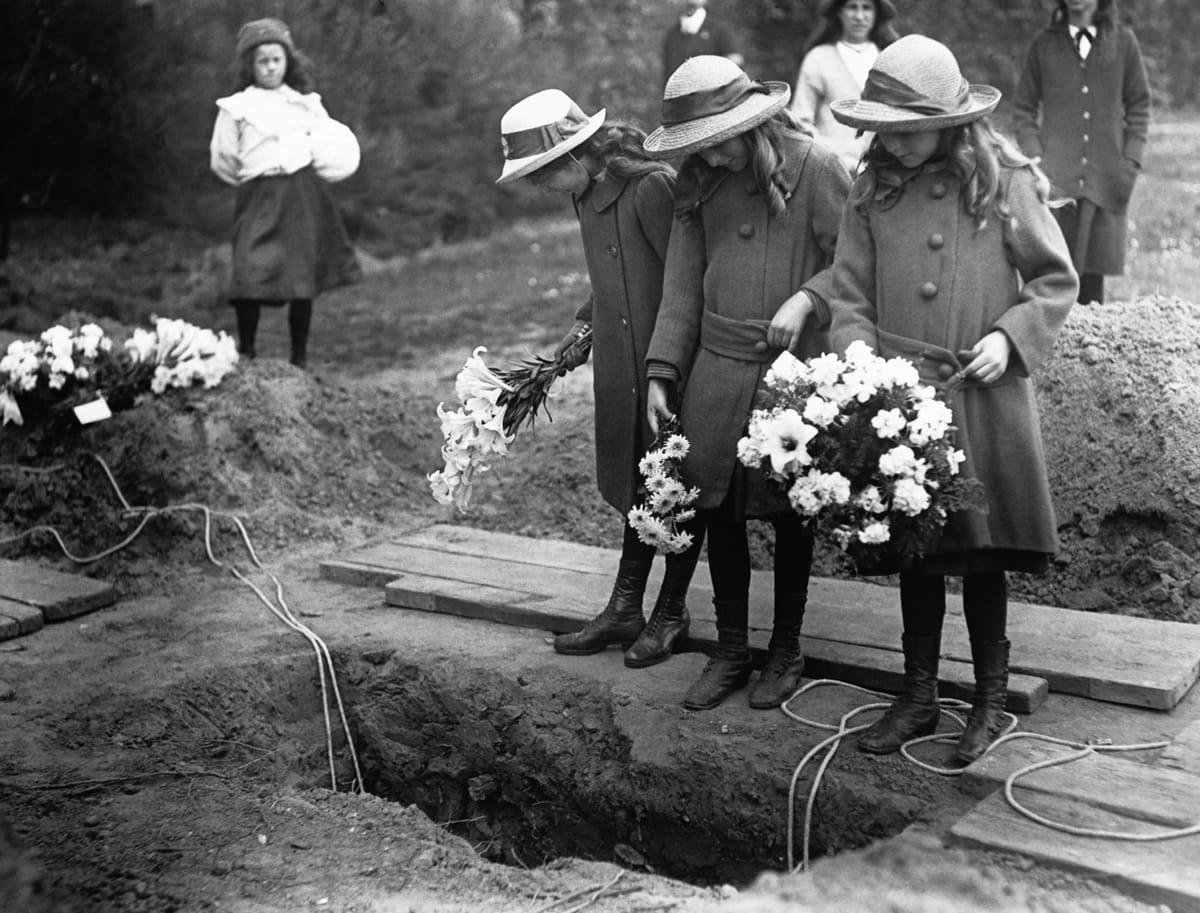 Girls Standing Over Grave