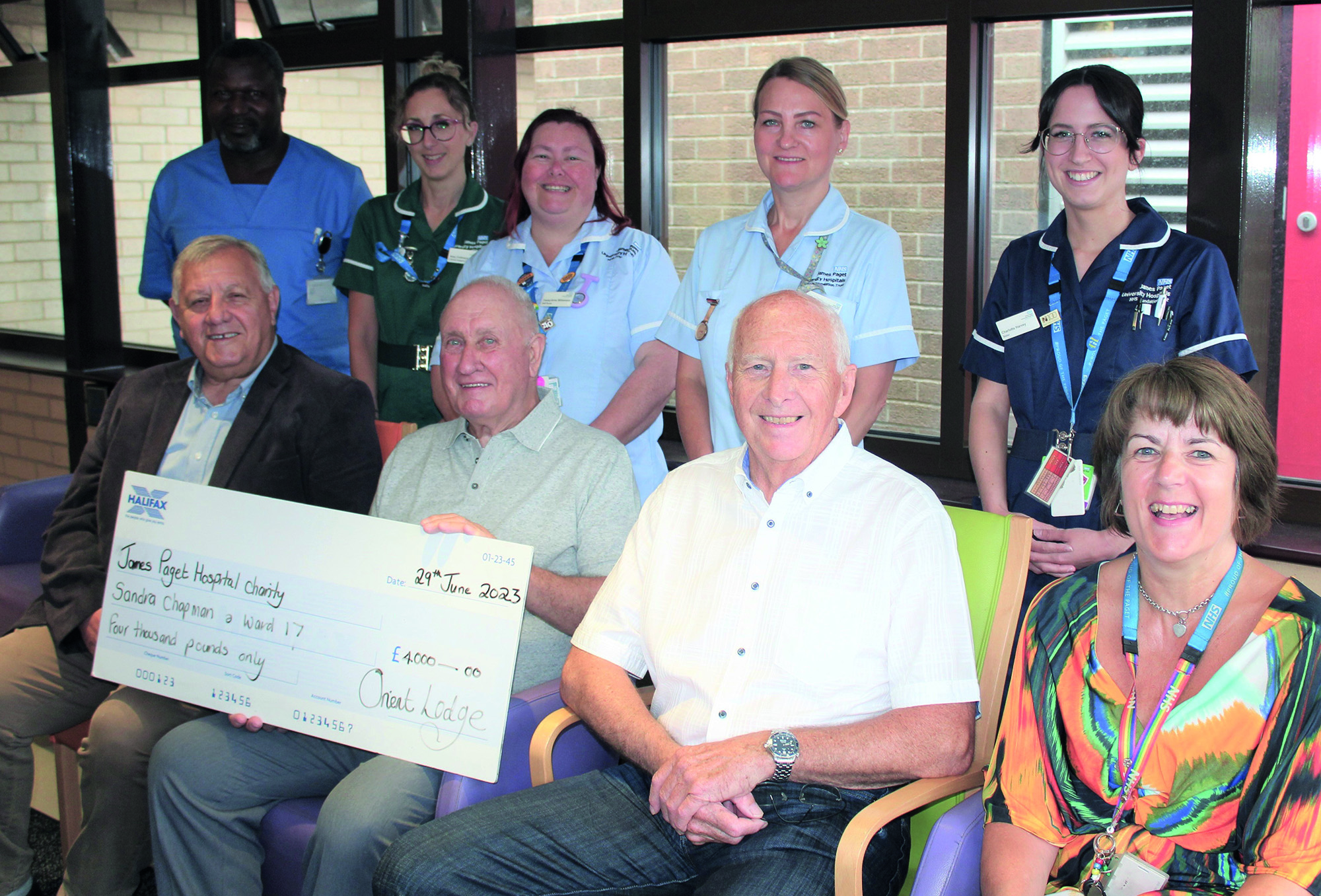 Lodge members with staff at the Sandra Chapman Centre, James Paget Hospital