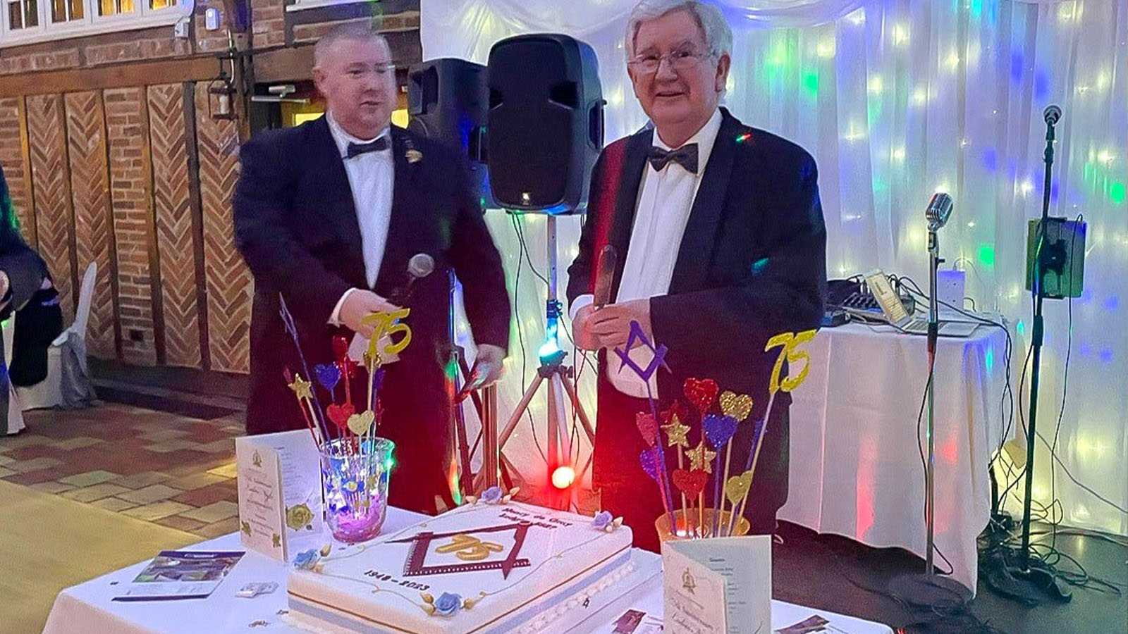 L-R Mark Harrison and Doug Noon with the 75th Anniversary Cake