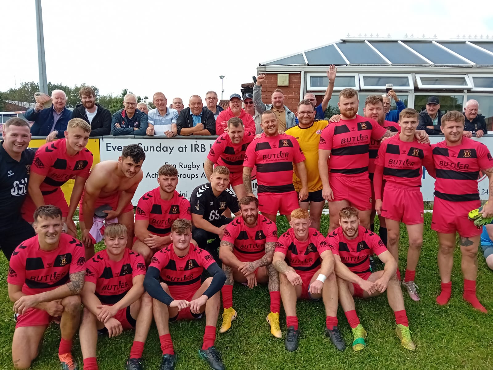 Ince Rose Bridge, victors, with some of the Bryn sponsors behind.