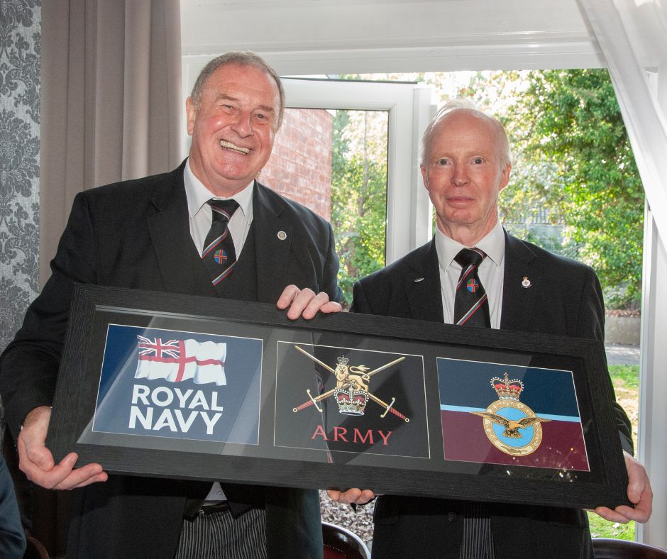 lincolnshire Freemasons with a banner of all the UK Armed Forces Logos