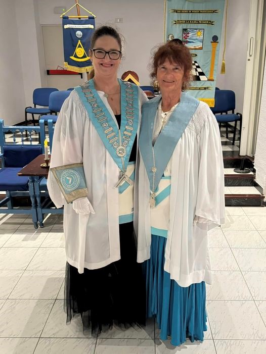 Two members of the Order of Women Freemasons in their regalia