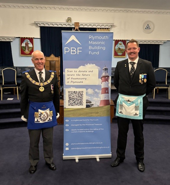 Devonshire Freemasons wearing regalia in a Lodge room