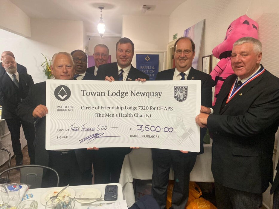 Freemasons with a cheque for charity