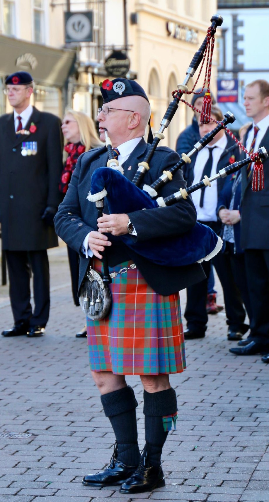 Cumbrian Freemason playing bagpipes