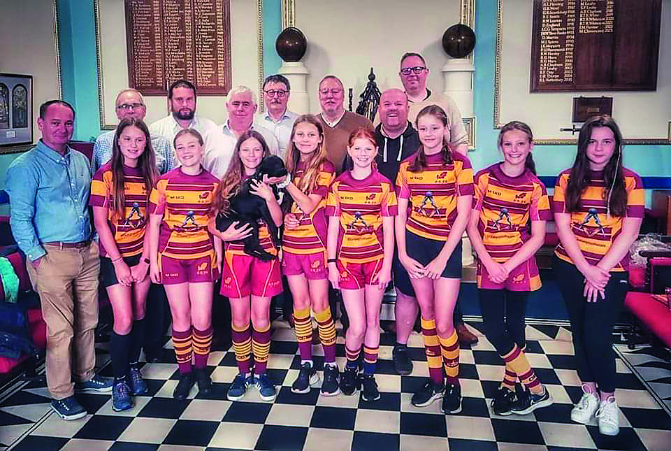 Okehampton Rugby Club Girls Under 14 team with a new kit provided by local Freemasons