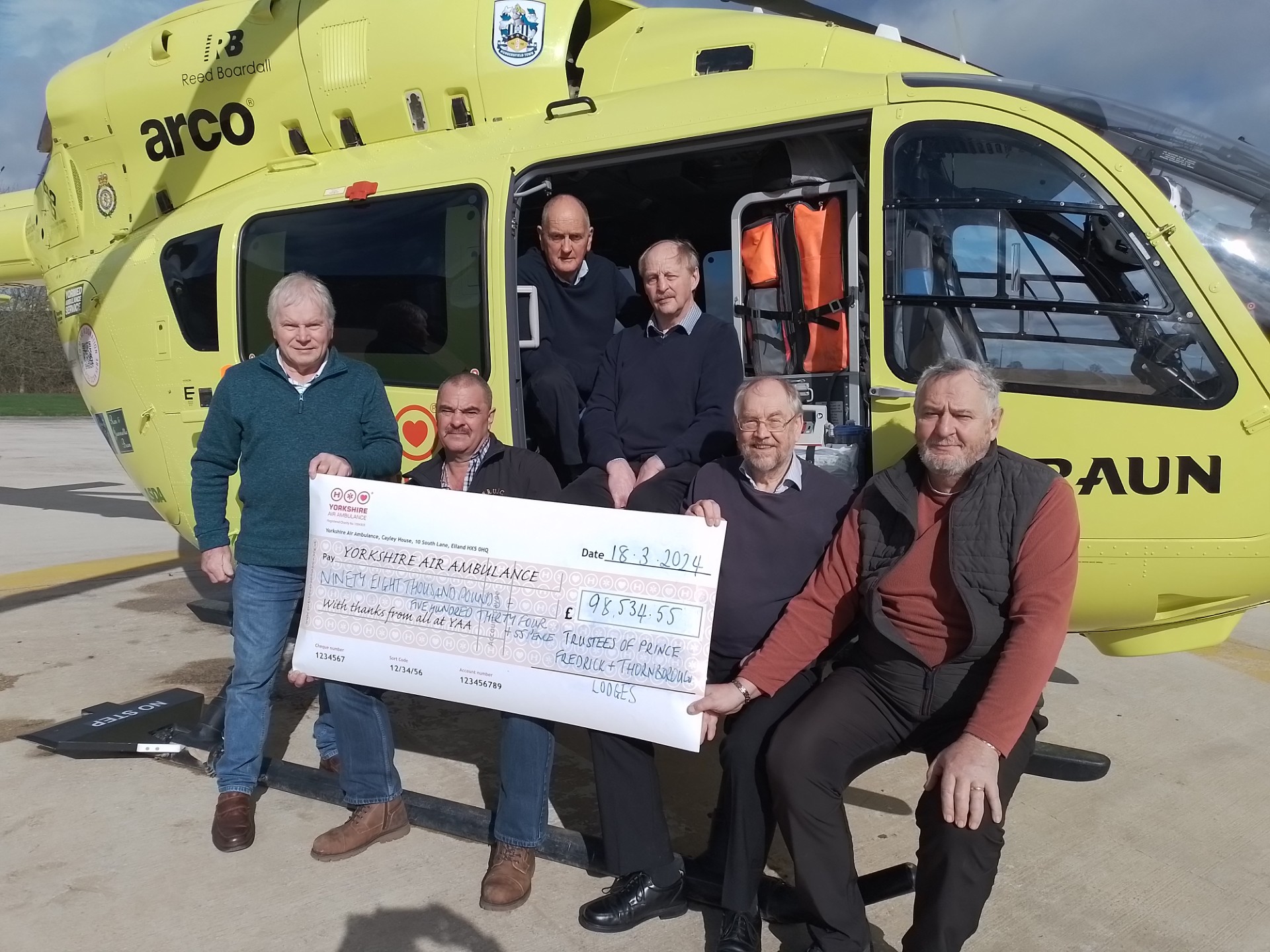 Yorkshire Freemasons presenting £98,000 to Yorkshire Air Ambulance