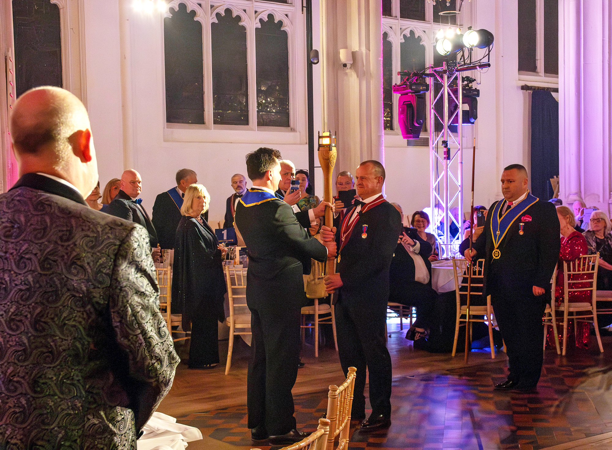 the Festival Torch being presented to Provincial Grand Master Jolyon Berry