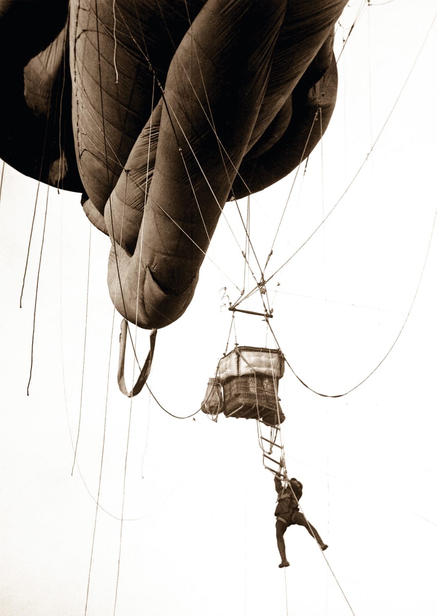 Aerial Naval observer coming down from balloon after a scouting tour, c.1918