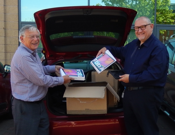 The presentation of 30 Galaxy Tablets by David Dey, Worcestershire Provincial Grand Charity Steward, to Jason Levy, Charity Director Worcestershire Acute Hospitals NHS Trust