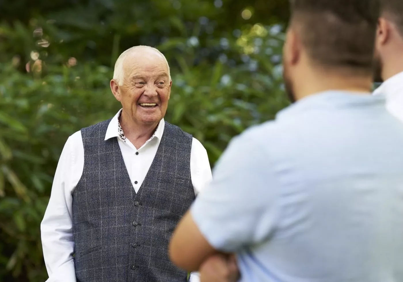 Three Freemasons chatting in the park