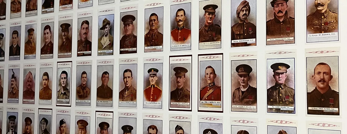 A wall showing images of famous masons