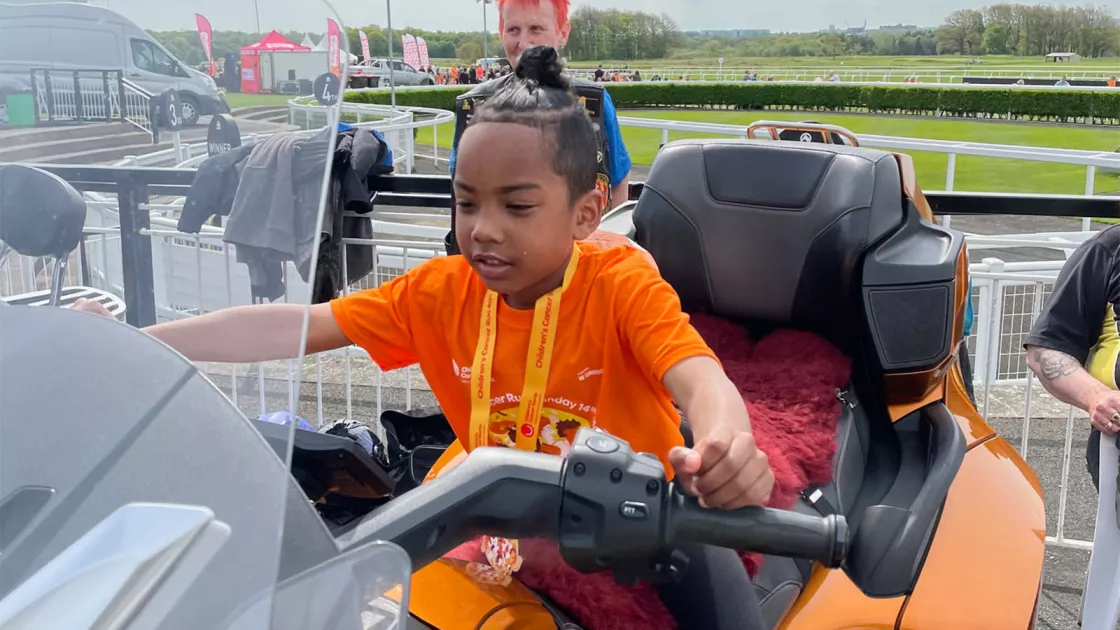 Children enjoying the display of motorbikes after the fun run