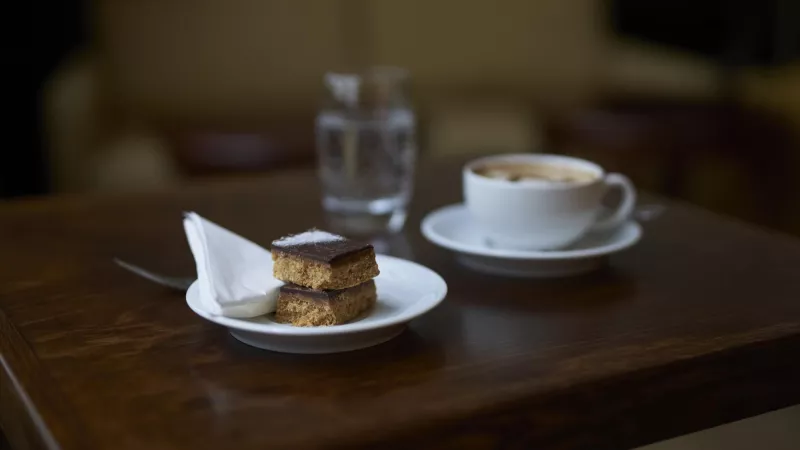 Cake and coffee on the table in the Café at Freemasons' Hall in London