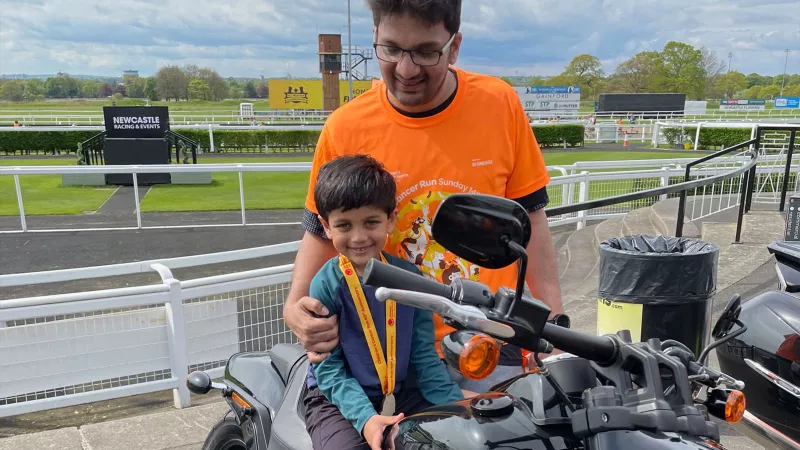 Children enjoying the display of motorbikes after the fun run