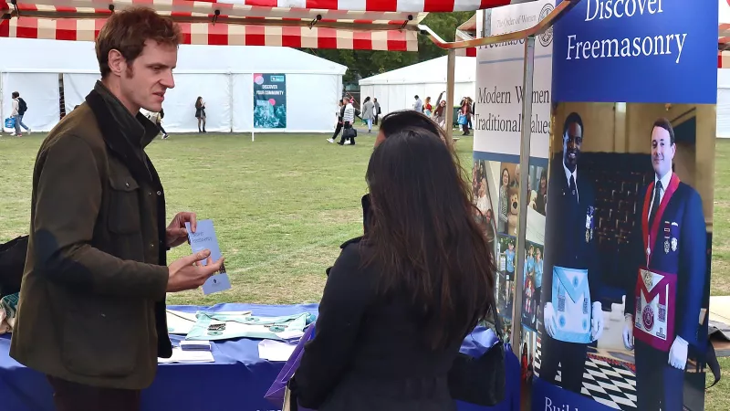 Simon Cooper talking to students at the Freshers Fair.