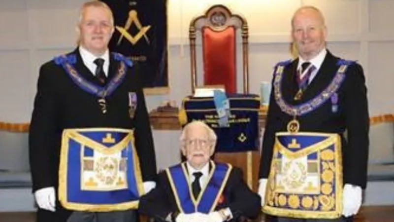 Roy Cunio celebrating 70 years in Freemasonry with Senior Cheshire Freemasons Andrew Bailey and the Head of Cheshire Freemasons David Dyson