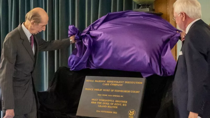 HRH The Duke of Kent and John Boyington CBE unveil the engraved stone together. 