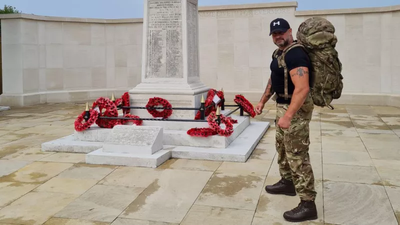 Andy Carter stops at his local cenotaph