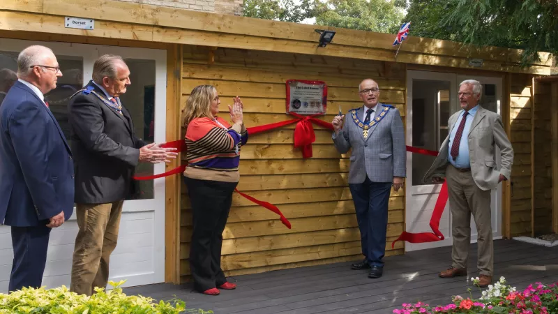 Freemasons from Dorset, Hampshire and the Isle of Wight cut the ribbon of the new counselling house 