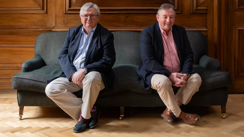 David Medlock and Steven Varley sitting together on a sofa