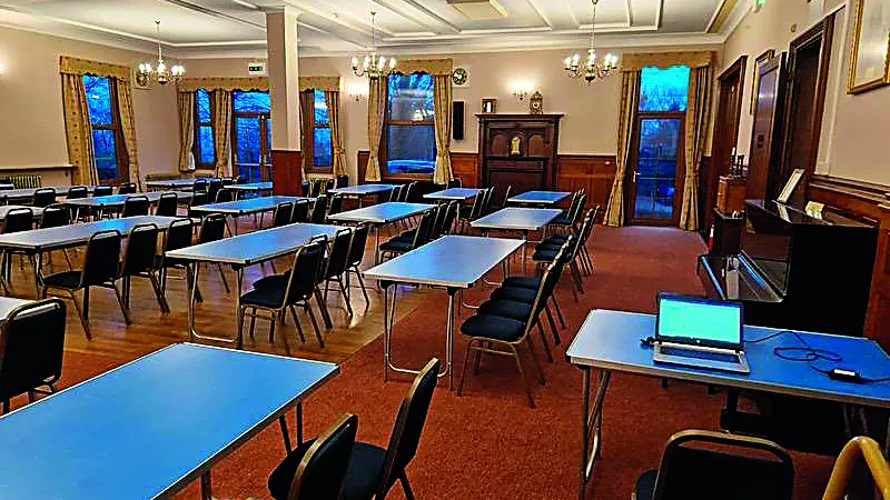 Photo of desks in a classroom 