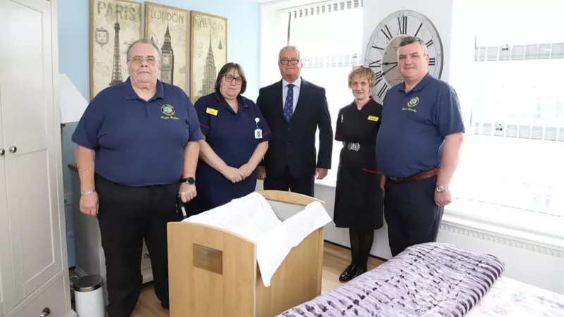 Roger Wilkes, Richard Wingett and Bernie Connolly with the Lead Nurse and the Director of Midwifery.