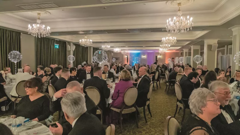 Jersey Freemasons in a banquet hall to celebrate 100 years of Lodge Saint Helier 
